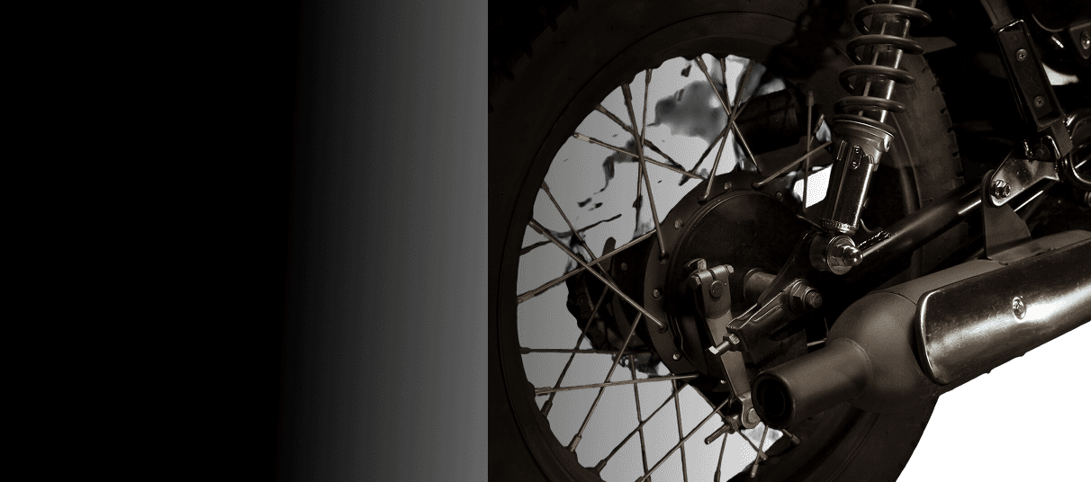 Racing motorcycle rear wheel and suspension detail