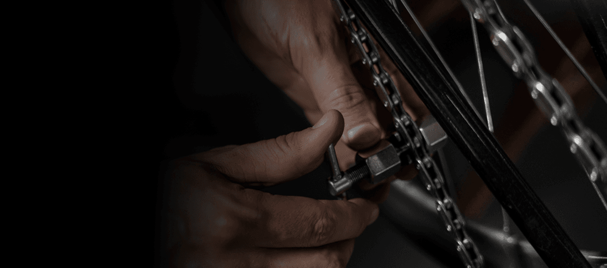 Bicycle chain and gears being adjusted